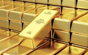 الذهب يرتفع متحديا قوة الدولار وصعود عوائد سندات الخزانة الأمريكية