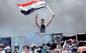 مع عودة الاحتجاجات الشعبية إلى العراق:  الحكومة العراقية الجديدة وصراع الإرادات الداخلية والخارجية 