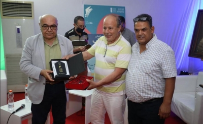 تكريم «الحبيب بيدة» في المعرض الوطني للكتاب التونسي: مسيرة إبداع بين متون اللوحة وغزارة النقد