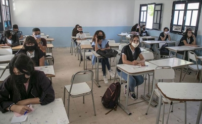 لكسر حلقة العدوى جامعتا التعليم الثانوي والابتدائي: المطالبة بحجر صحي شامل