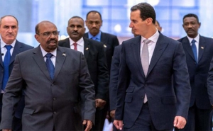 زيارة الرئيس السوداني إلى سوريا:  حكومة دمشق ومساعي إعادة التطبيع مع الدول العربية 