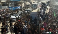 وصول أسرى فلسطينيين محررين من سجون الاحتلال إلى غزة