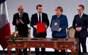 تجديد معاهدة آكس لا شابال بين فرنسا و ألمانيا:  ماكرون وميركل يدعمان العلاقات الثنائية بين البلدين 