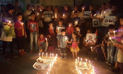 غزة.. وقفة شموع تضامنية مع الأسرى الفلسطينيين في السجون الإسرائيلية