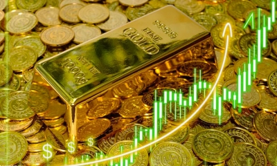 الذهب يسجل سعرا قياسيا يتخطى 2100 دولار للأونصة