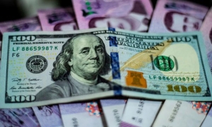 بنك سوريا المركزي يخفض قيمة الليرة أمام الدولار