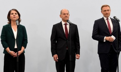 الإعلان على ائتلاف حكومي في ألمانيا بقيادة أولافشولز:  الاشتراكيون والخضر والليبراليون يتفقون على تطوير هيكلي للنسيج الاقتصادي