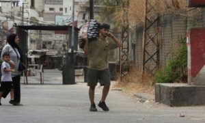 منظمة: نزوح 20 ألفا بسبب اشتباكات بمخيم للفلسطينيين في جنوب لبنان
